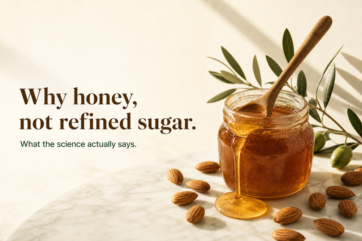 Raw honey dripping from a wooden dipper